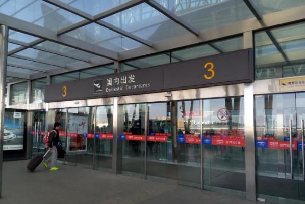 Huanghua International Airport T2 departure level to arrival level door window film application