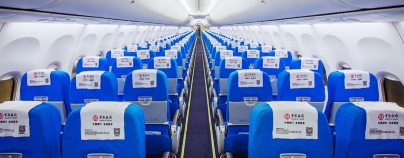 Advertisement for headrest scarves in the cabin of China Airlines aircraft