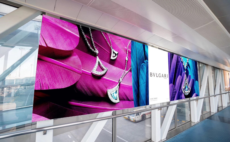 Airport advertisement: an eternal symbol engraved on global citizens