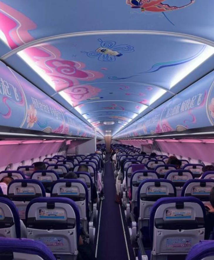Juneyao Airlines aircraft cabin three-piece advertisement